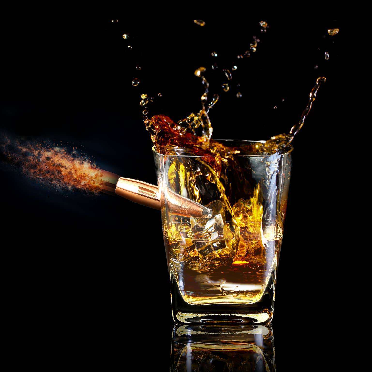 Bullet Through Whiskey Glass