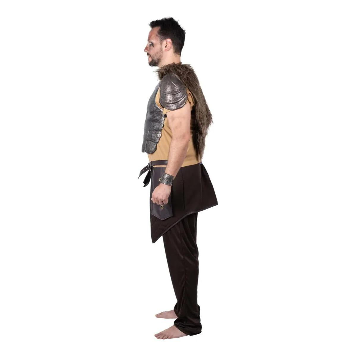 Person wearing a warrior costume with armor and faux fur on a white background